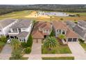 Luxury home community with golf course and lake views at 15939 Vetta Dr, Bella Collina, FL 34756