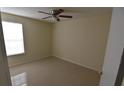 Simple bedroom with tile floors and a closet at 1924 Lake Atriums Cir # 59, Orlando, FL 32839