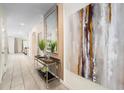 Bright and spacious entryway with a console table and large art at 2759 Bookmark Dr, Kissimmee, FL 34746
