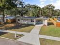 Single story home with large backyard and driveway at 4215 Kildaire Ave, Orlando, FL 32812