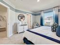 Bedroom with white dresser and ensuite access at 3307 Private Oak Dr, Apopka, FL 32703