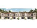 Three-unit townhome building with attached garages and neutral color palette at 545 Zinfandel Dr, Holly Hill, FL 32117