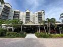 Building exterior showcasing the entrance and landscaping at 14501 Grove Resort Ave # 2716, Winter Garden, FL 34787