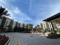 Community view with building exteriors and courtyard at 14501 Grove Resort Ave # 2716, Winter Garden, FL 34787