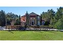 Impressive two-story house nestled amongst the trees at 502 W Lester Rd, Apopka, FL 32712