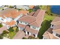 Aerial view of a two-story house with a brown tile roof at 13333 Oakenshaw Ln, Orlando, FL 32832