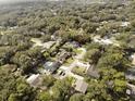 Wide aerial view of the property and surrounding houses at 810 E Yorkshire Dr, Deland, FL 32724