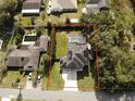 Aerial view showing house, pool, and large backyard at 810 E Yorkshire Dr, Deland, FL 32724