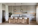 Spacious kitchen featuring modern cabinetry and a large island at 227 Page St, Orlando, FL 32806