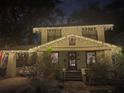 House exterior at night decorated with Christmas lights at 705 E Pine St, Orlando, FL 32801