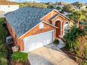 Stunning aerial view of a single-Gathering home with a new roof and two-car garage at 167 Castaway Beach Way, Kissimmee, FL 34746