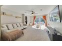 Bright Gathering room with sliding glass doors leading to the patio at 59 Pine Dr, Debary, FL 32713