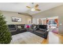 Open concept living room featuring a large sectional sofa at 59 Pine Dr, Debary, FL 32713