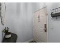 Interior condo entryway with light blue walls and small table at 608 Gran Bahama Blvd # 608, Davenport, FL 33897
