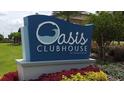 Sign for Oasis Clubhouse at ChampionsGate at 8979 Azalea Sands Ln, Davenport, FL 33896