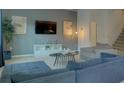 Spacious living room with sectional sofa and modern decor at 4565 Cabello Loop, Kissimmee, FL 34746