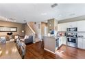 Modern kitchen with stainless steel appliances and white cabinets at 3212 Cupid Pl, Kissimmee, FL 34747