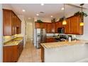 Spacious kitchen with granite countertops and stainless steel appliances at 7513 Excitement Dr, Reunion, FL 34747