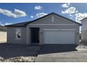 New construction home with gray siding and a white garage door at 1425 Arbor Hill Dr, Deltona, FL 32725