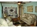 Relaxing living room with comfy seating and decorative accents at 222 5Th St, Winter Haven, FL 33880