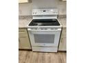 White electric range and oven at 315 Lakepointe Dr # 302, Altamonte Springs, FL 32701