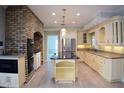 Spacious kitchen with island and stainless steel appliances at 772 Bear Creek Cir, Winter Springs, FL 32708