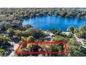 Aerial view of property, showcasing its sizable lot at 411 Sylvan Dr, Winter Park, FL 32789