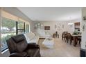 Open living and dining area with comfortable seating at 7022 Talbot Dr, Orlando, FL 32819