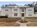 Two-story house with solar panels and landscaping at 800 Daybreak Dr, Fruitland Park, FL 34731