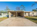View of a carport attached to a single story home at 1921 Rockwell Rd, Orlando, FL 32808