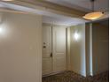 Condo entry with double doors and neutral colors at 1925 S Atlantic Ave # 502, Daytona Beach, FL 32118