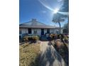Front view of a charming condo with walkway and lush landscaping at 2810 Plaza Terrace Dr # 2810, Orlando, FL 32803