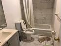 Bathroom includes shower/tub combo and toilet at 1214 N Hart Blvd, Orlando, FL 32818