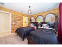 Harry Potter-themed bedroom with twin beds and mural at 1230 Aloha Blvd, Davenport, FL 33897