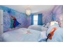 Frozen-themed bedroom with twin beds and mural at 1230 Aloha Blvd, Davenport, FL 33897
