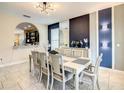 Bright dining room featuring a large table and stylish decor at 5303 Wildwood Way, Davenport, FL 33837