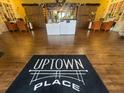 Uptown Place inviting lobby with comfortable seating and high ceilings at 911 N Orange Ave # 327, Orlando, FL 32801