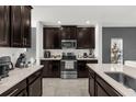 Modern kitchen featuring stainless steel appliances and a gas stove at 236 Denali St, Haines City, FL 33844