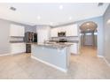 Modern kitchen with stainless steel appliances and granite countertops at 441 Tallow Wood Cir, Debary, FL 32713