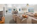 Bright and airy living room with comfy seating and a dining area at 3334 Mount Tabor Rd, Lakeland, FL 33810
