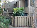 Condo entrance with private balcony and lush landscaping at 5308 Pebble Beach Dr # F-01-1, Orlando, FL 32811