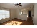 Living room with hardwood floors and a ceiling fan at 825 Grand Regency Pointe # 200, Altamonte Springs, FL 32714