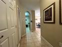 Hallway view into the kitchen and dining area at 2306 Silver Palm Dr # 103, Kissimmee, FL 34747
