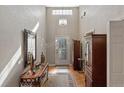 Bright foyer with hardwood floors and decorative accents at 4112 Aberdeen Ln, Lake Wales, FL 33859