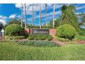 Kingsbridge East community entrance sign with landscaping at 497 Lakepark Trl, Oviedo, FL 32765