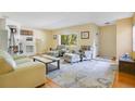 Bright and airy living room with hardwood floors and ample natural light at 7200 Grace Rd, Orlando, FL 32819