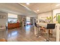 Open living area with hardwood floors and modern furniture at 151 E Washington St # 201, Orlando, FL 32801