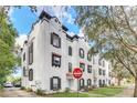Exterior view of white townhomes with a 