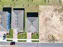 An aerial view of the property and the surrounding neighborhood at 14568 Crestavista Ave, Clermont, FL 34714