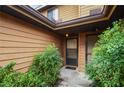 Townhome entry with double doors and landscaping at 707 Carpenters Way # 45, Lakeland, FL 33809
